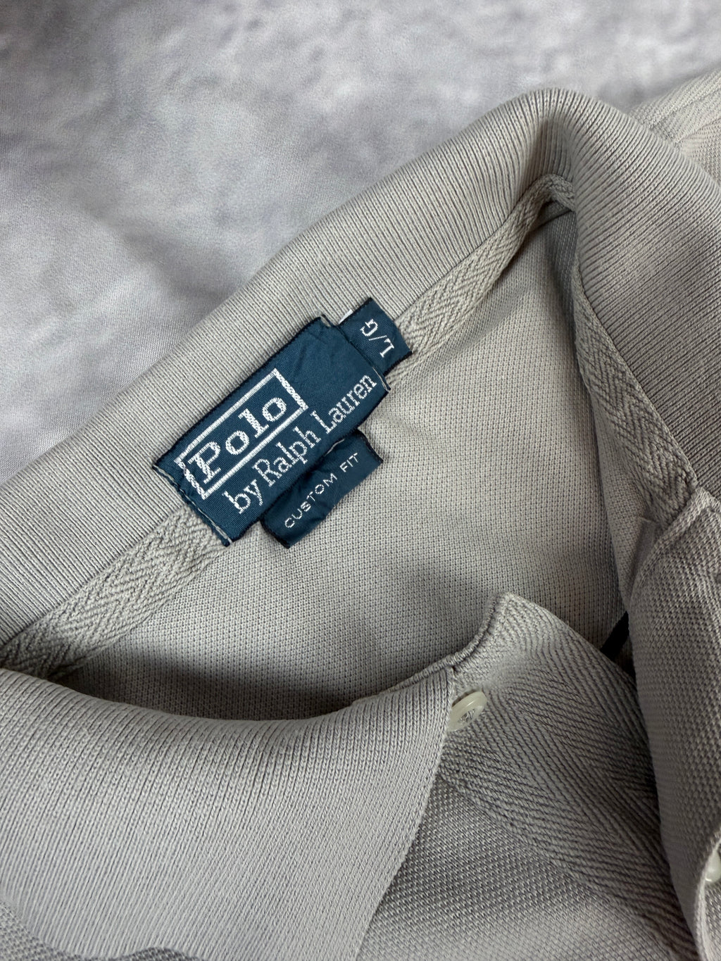Ralph Lauren Polo (L)
