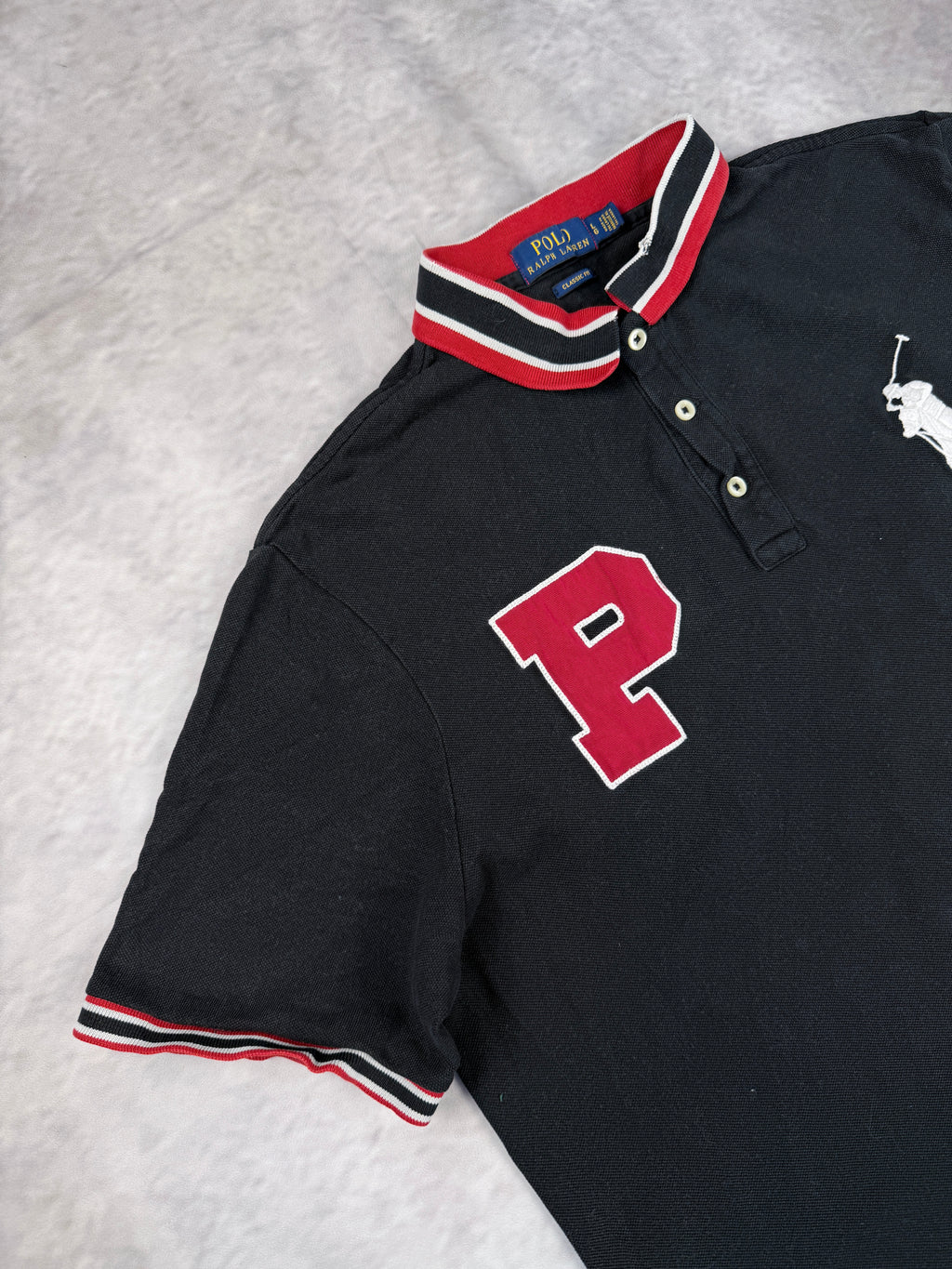 Ralph Lauren Polo (L)