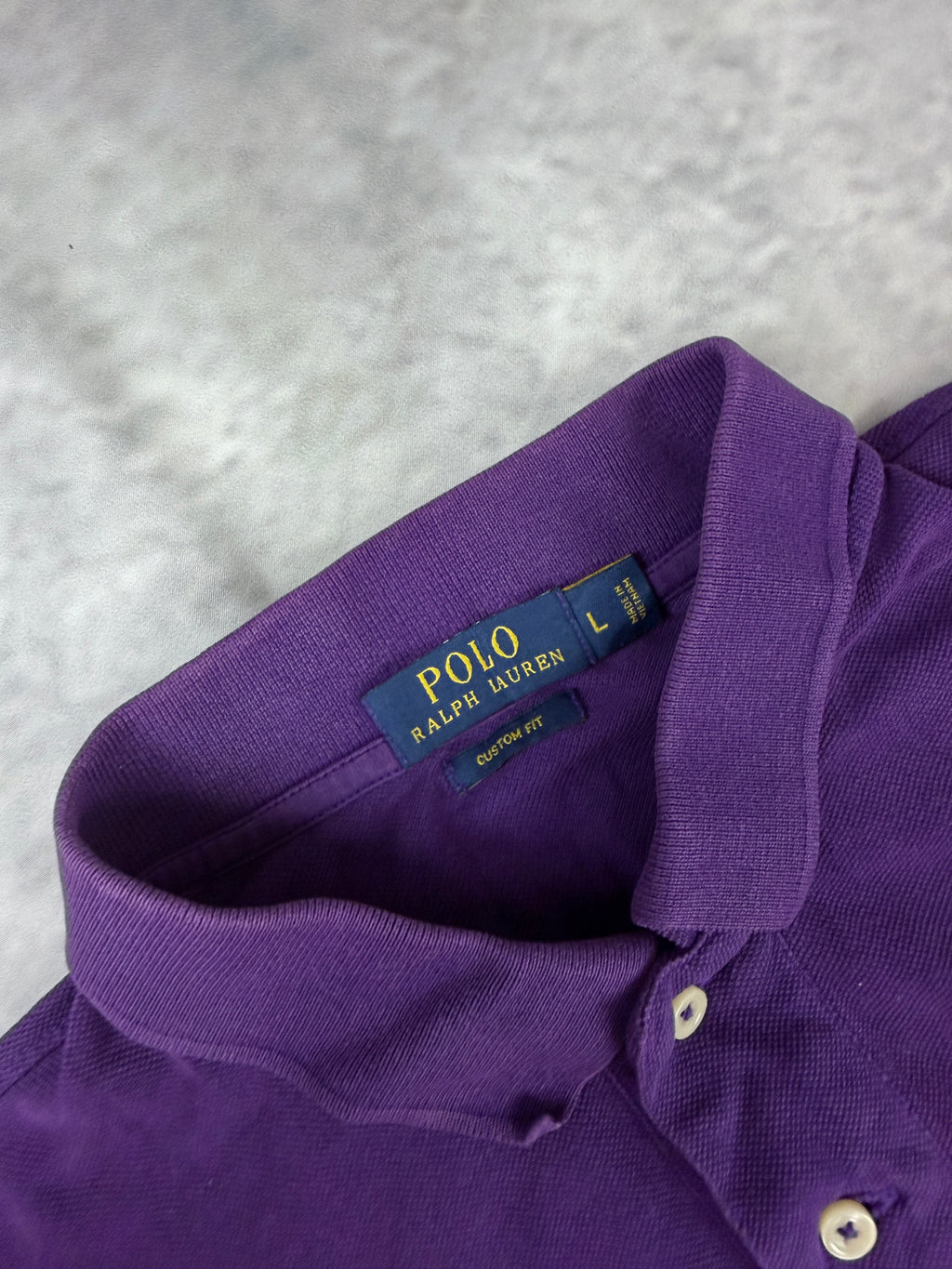 Ralph Lauren Polo (L)