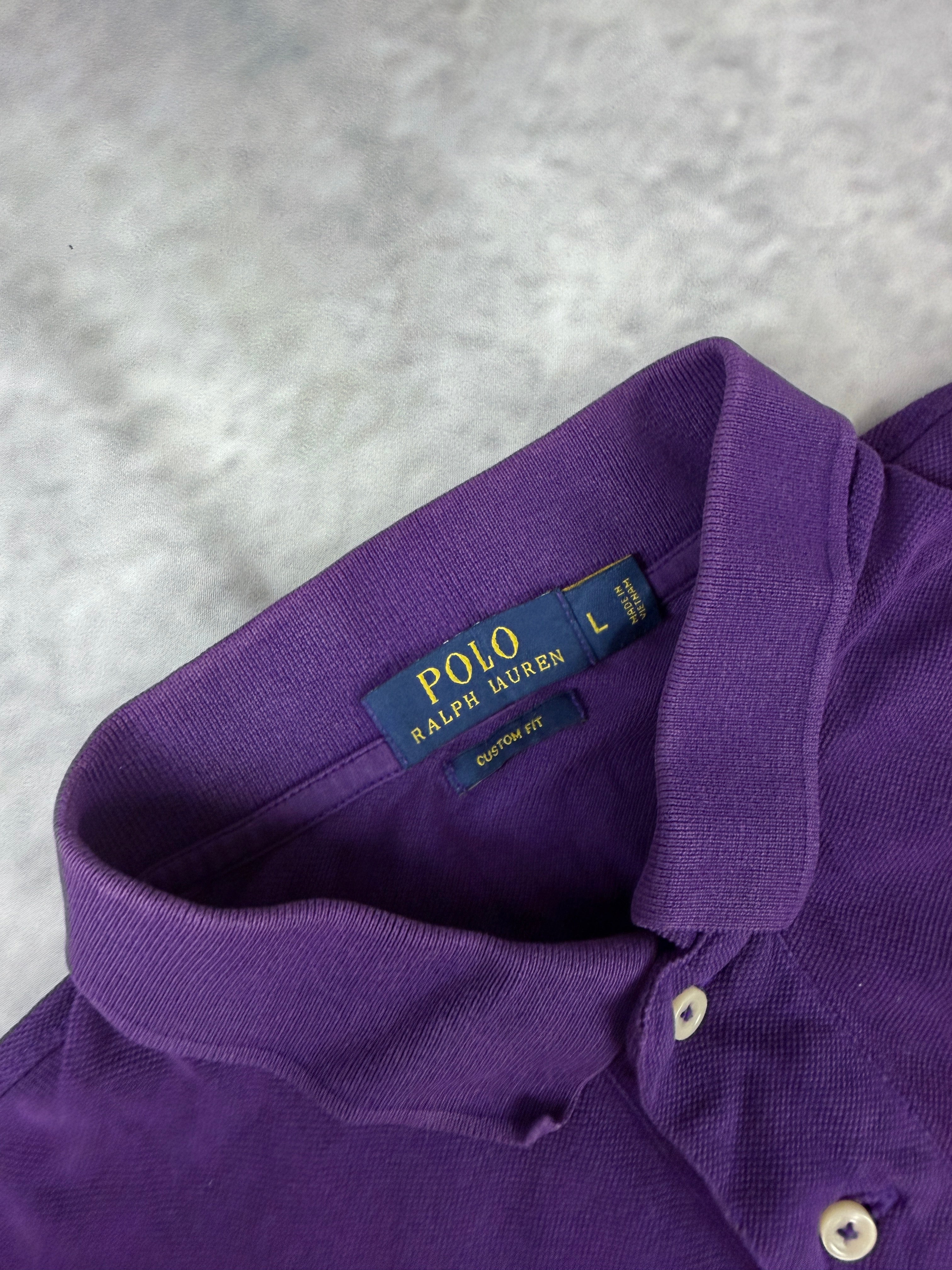 Ralph Lauren Polo (L)